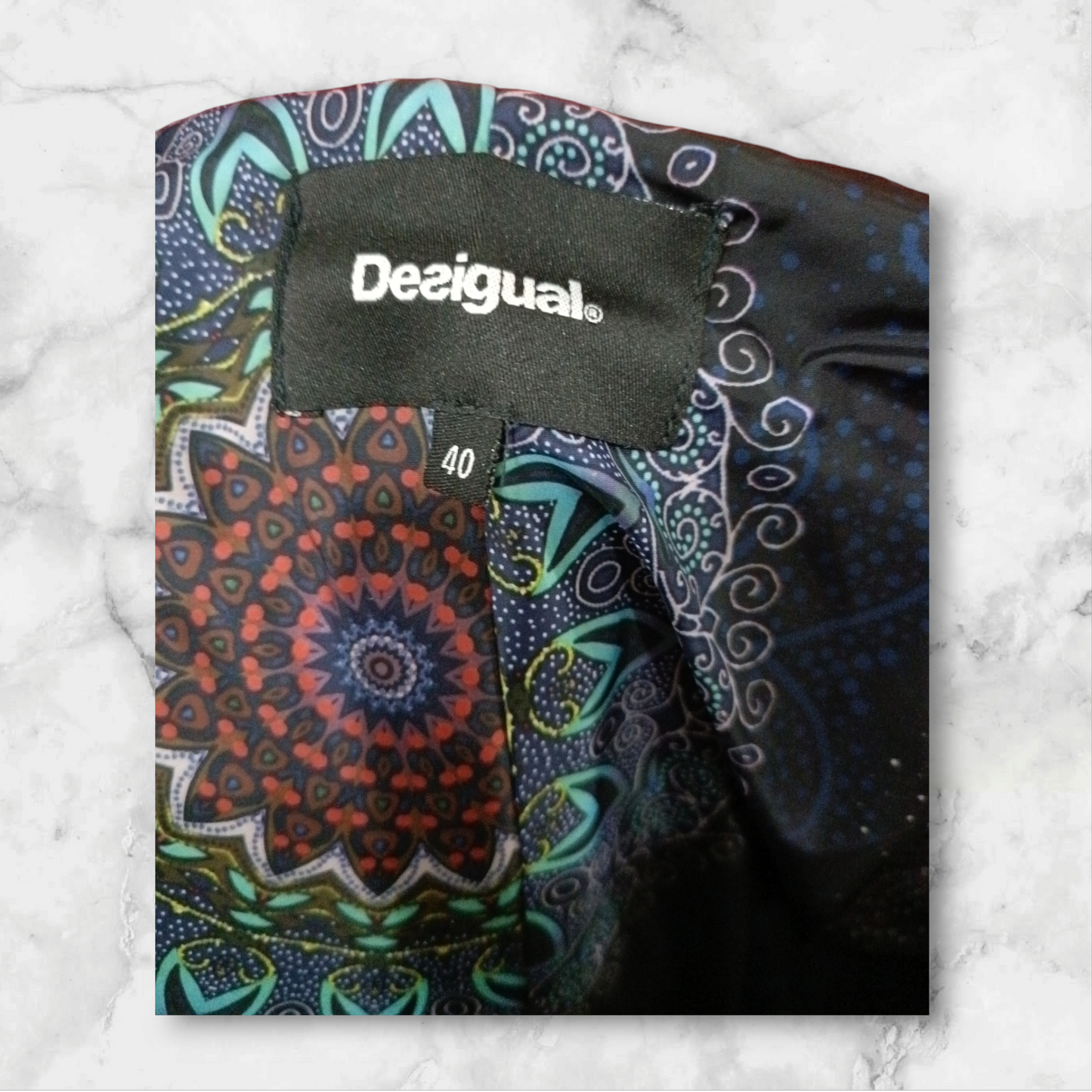 CHAQUETA DESIGUAL MUJER